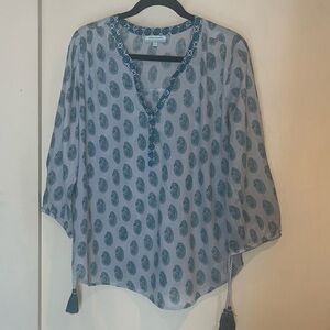 World Market boho style top with tasseled sleeves.  Size large